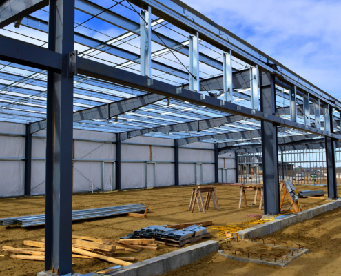 Steel frame commercial building under construction for expanding local business